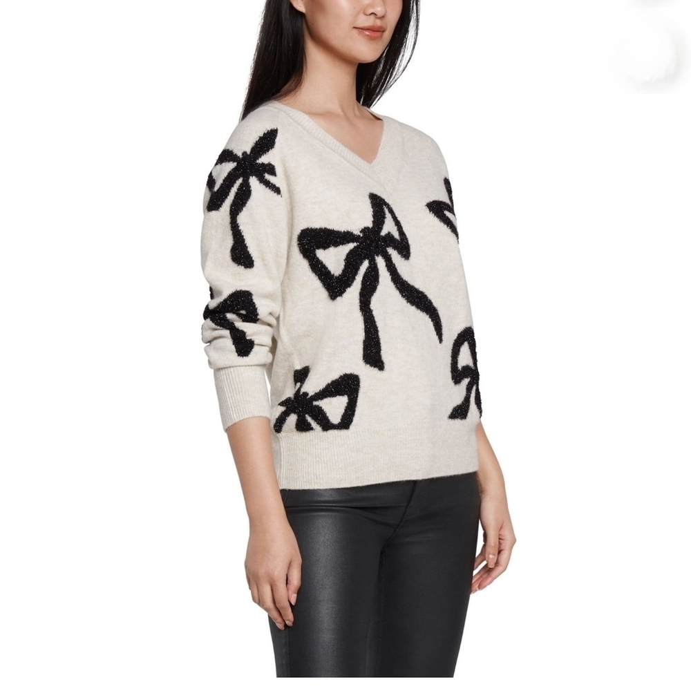Express V-Neck Cream Sweater with Black Bow Accents